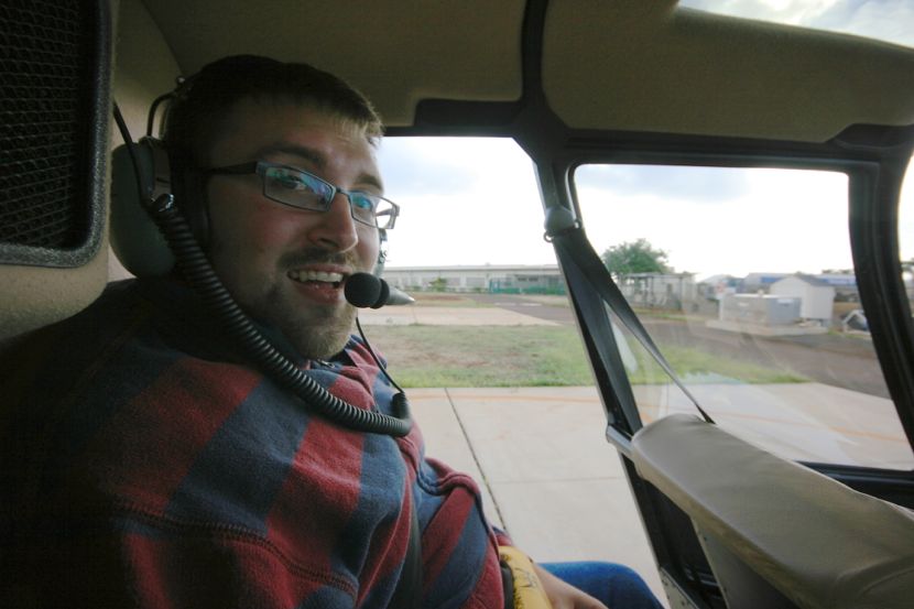 Robert in the helicopter, barely masking his fear